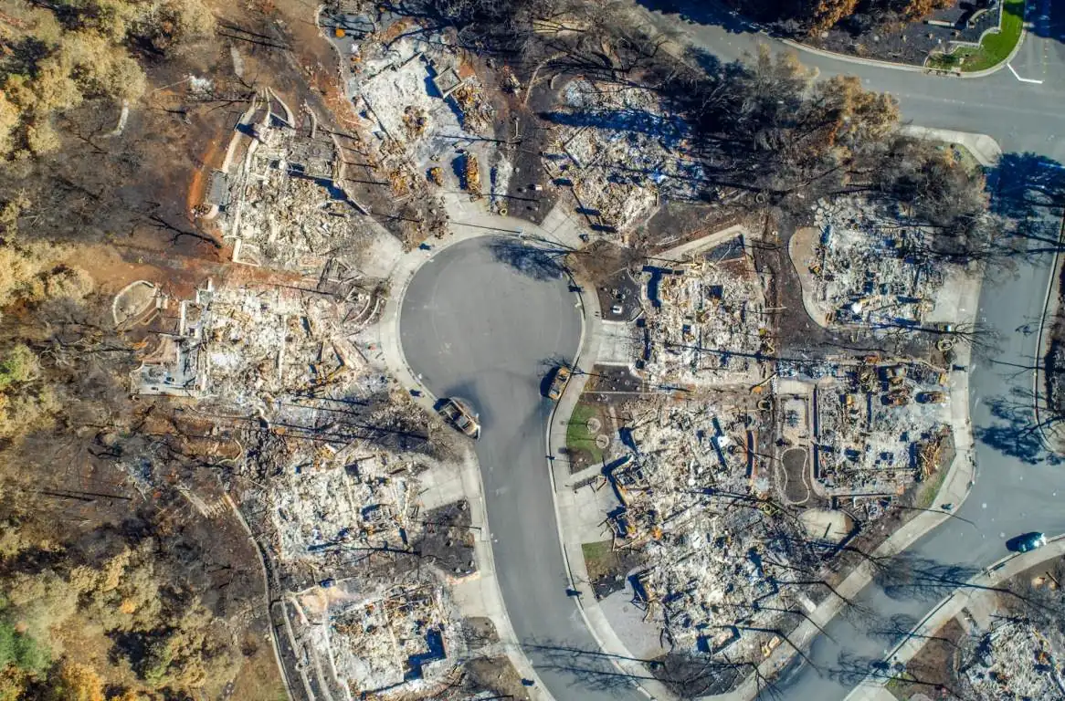 Aerial view of a neighborhood after a wildfire