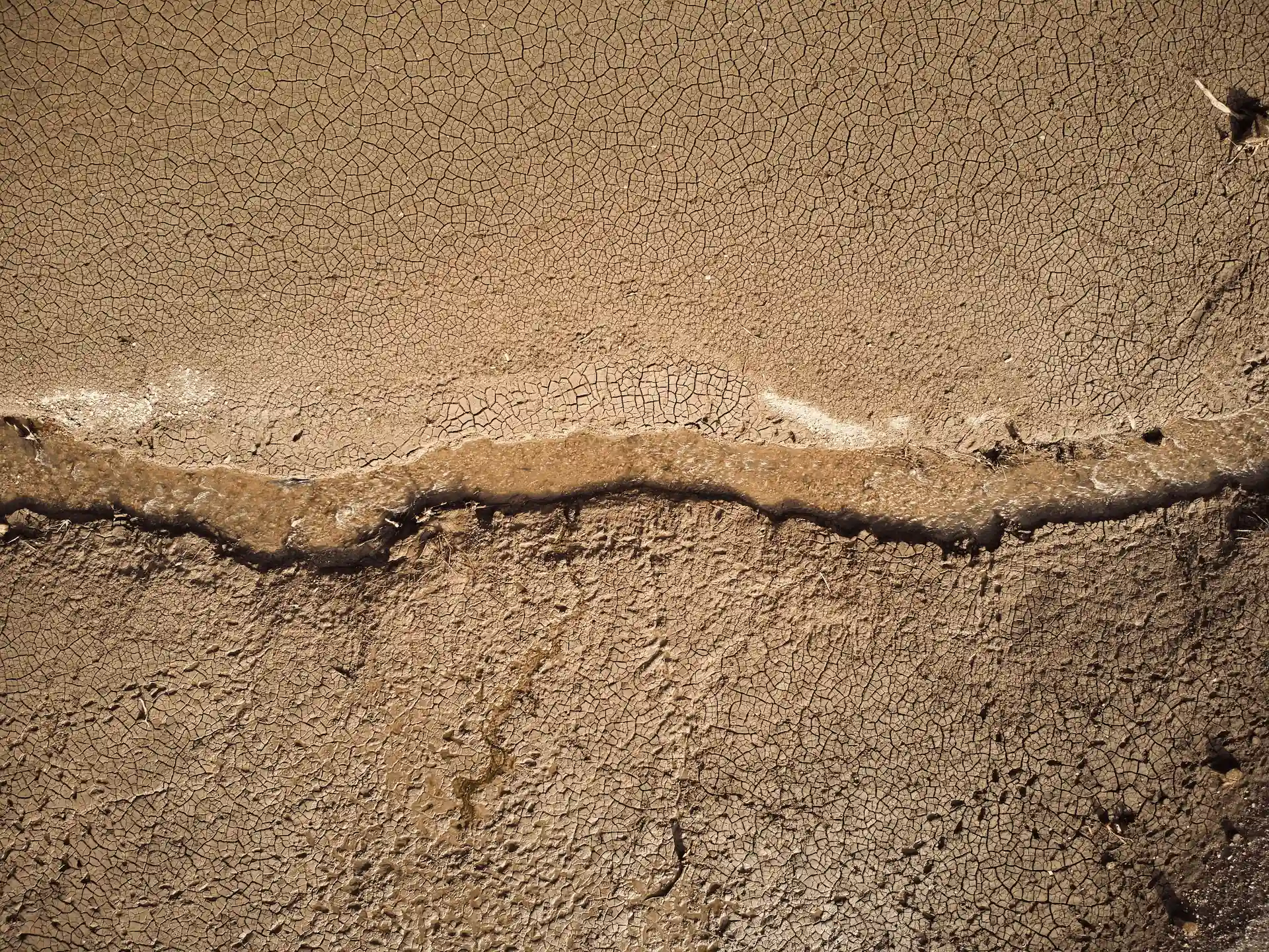 Aerial view of dry cracked earth